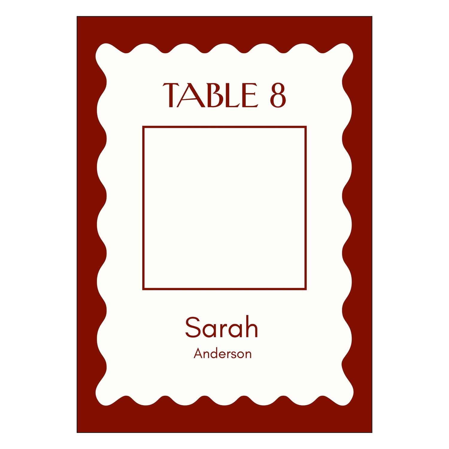 Table assignment card with 'Table 8' and 'Sarah Anderson' written on it. the card has a red border and red writing with a white background and  with space for a custom photo magnet in the middle